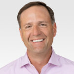 Headshot of RevGen CEO Kirk Mielenz