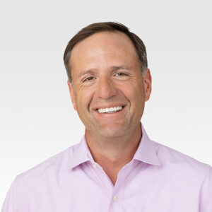 A headshot of RevGen CEO Kirk Mielenz
