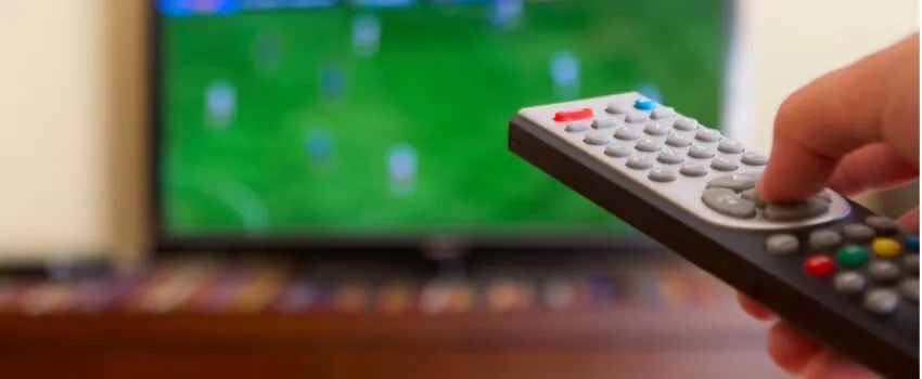 television remote control in human hands