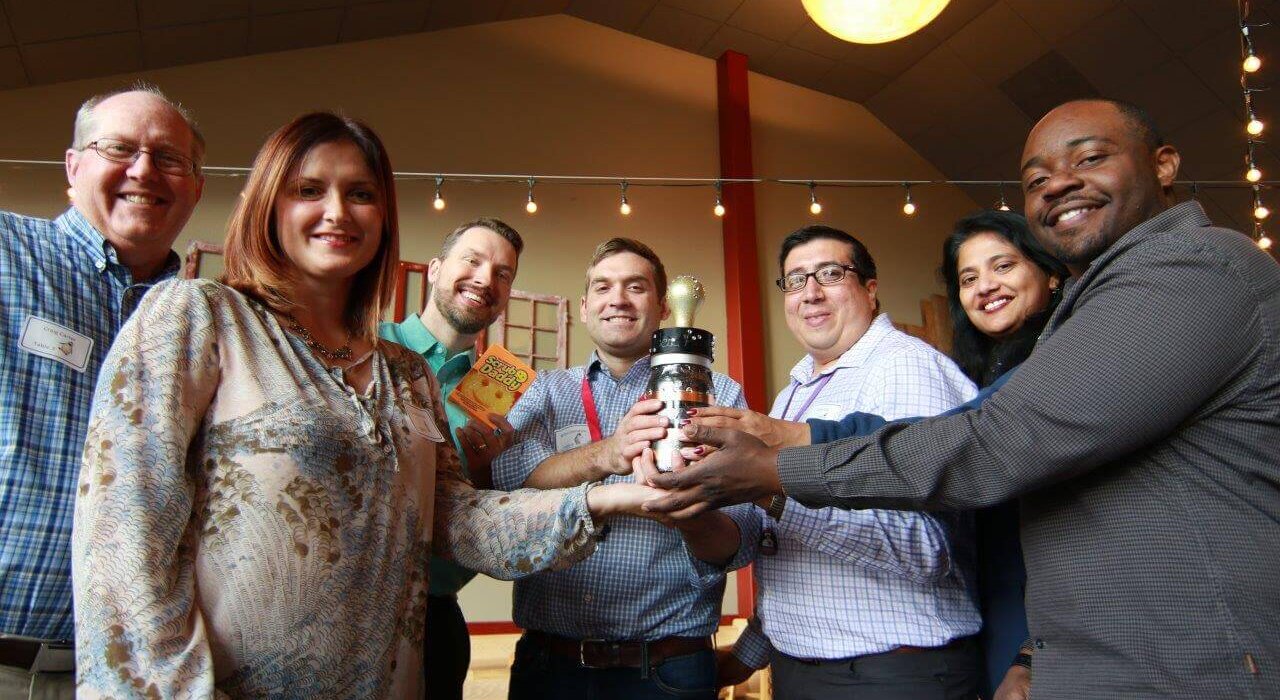 Innovation Maker winners with trophy