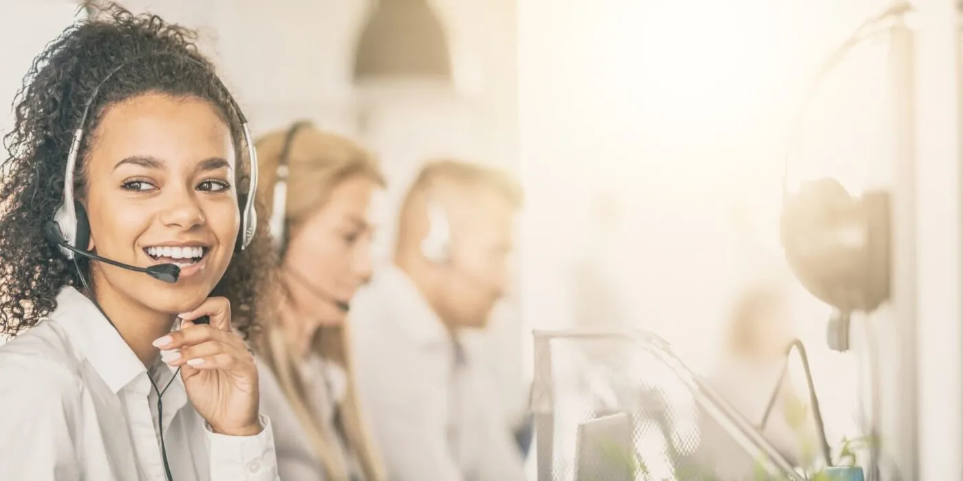 call center worker accompanied by her team