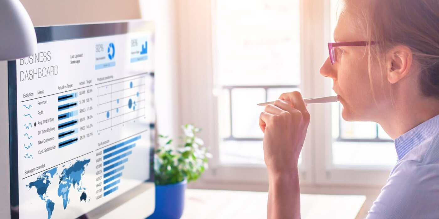 Businesswoman using an analytics dashboard