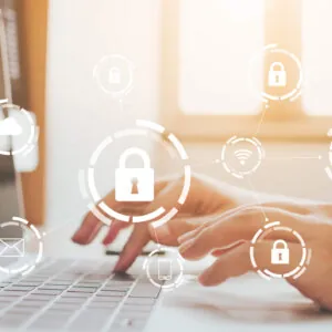 Businessman working on laptop. Protection network security computer and safe your data concept. Digital crime by an anonymous hacker