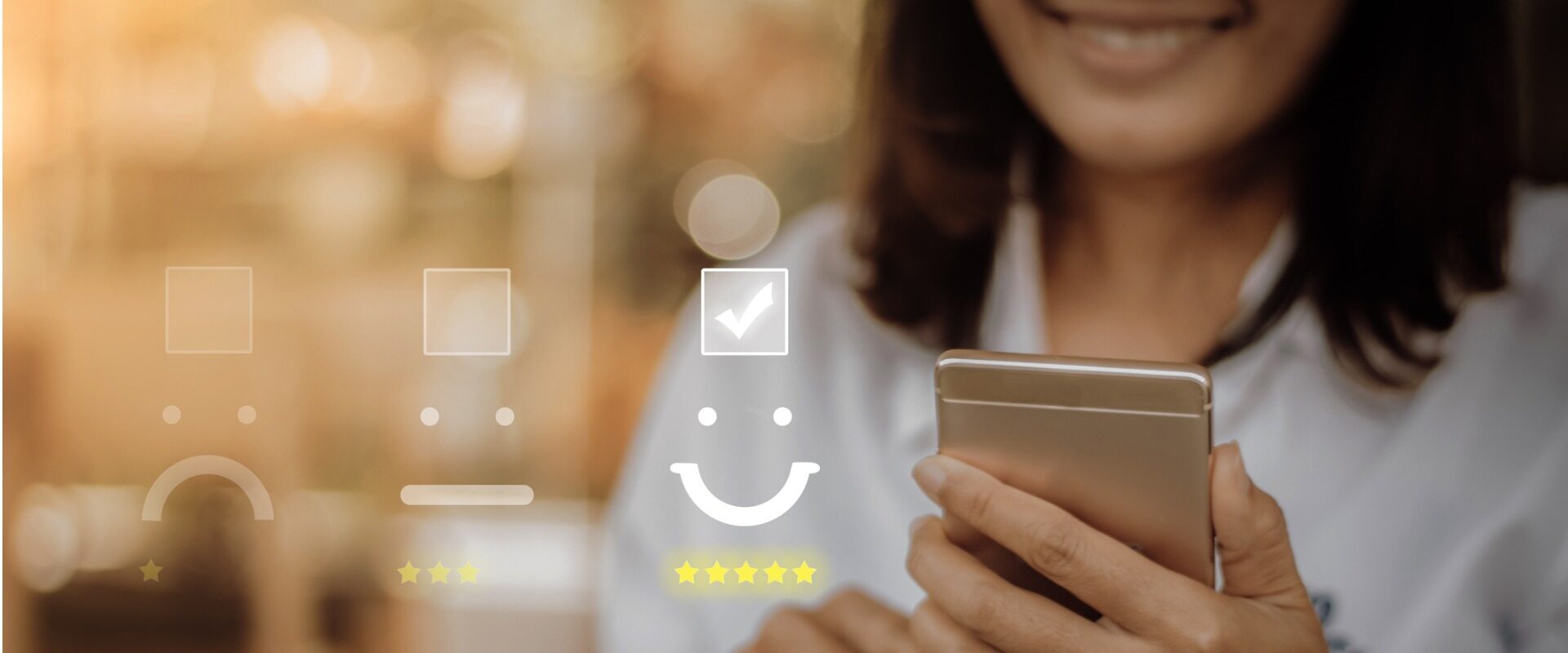 Smiling woman on smartphone with ratings and emojis superimposed over top of image