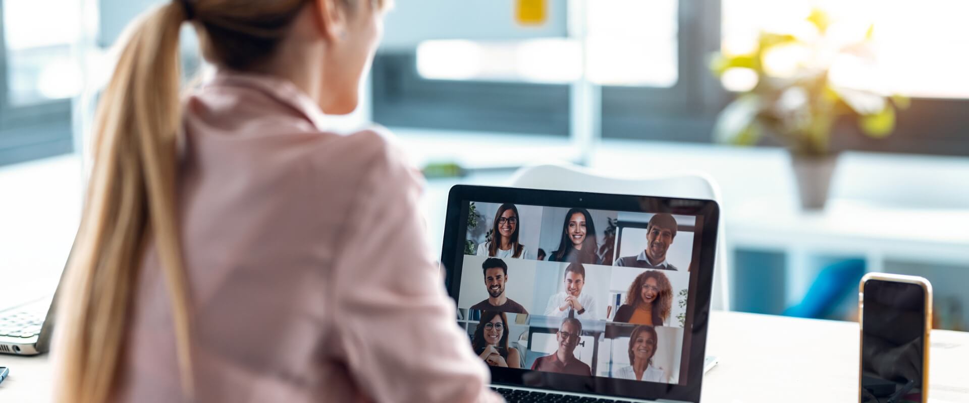 female employee speaking on video call