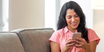 woman looking at her phone