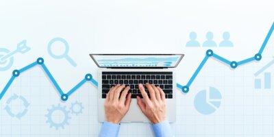 Overhead shot of person typing on computer