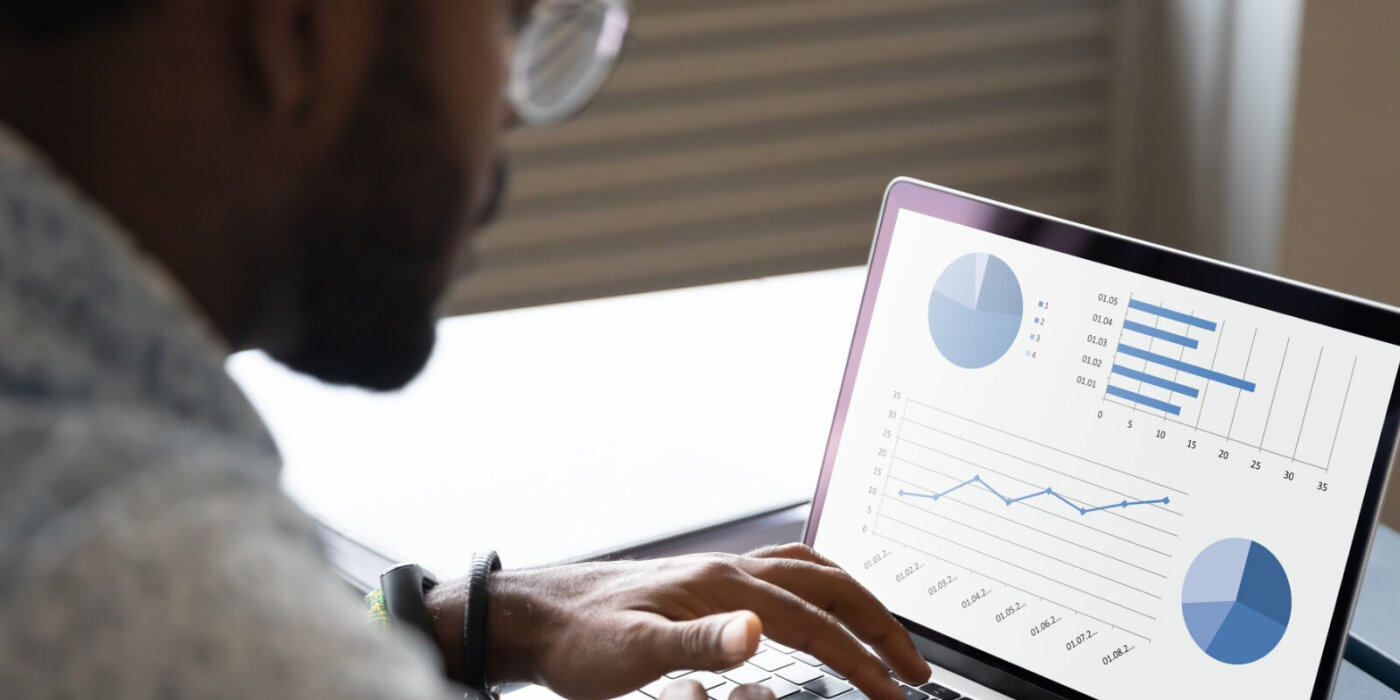 Person analyzing data on computer