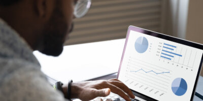Person analyzing data on computer