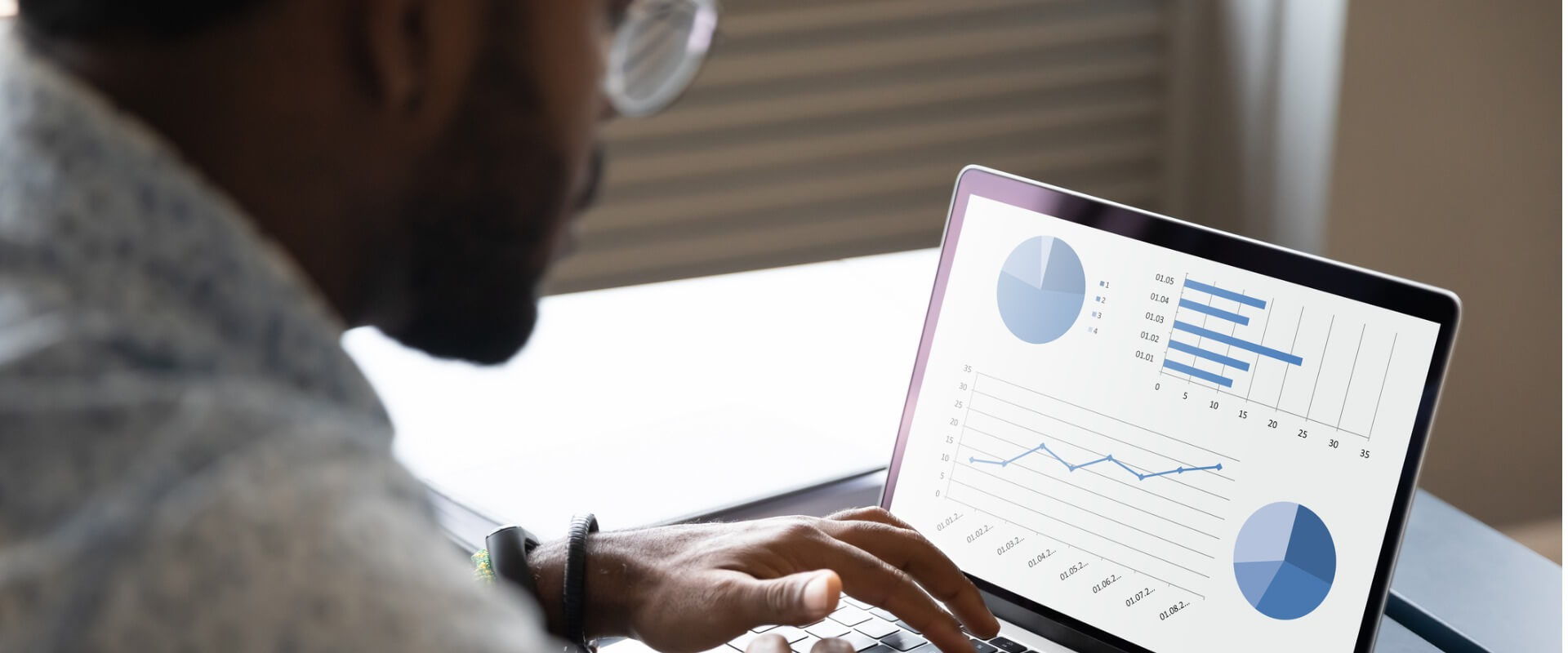 Person analyzing data on computer