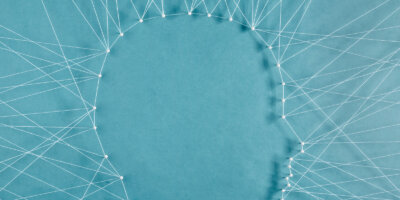 String forming a silhouette of a head