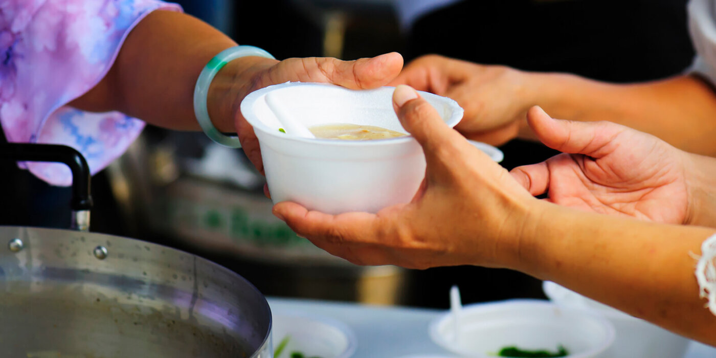 Passing a bowl of soup