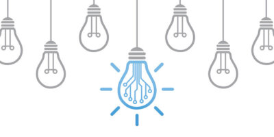 header image of several lightbulbs hanging from the ceiling, one light up in blue