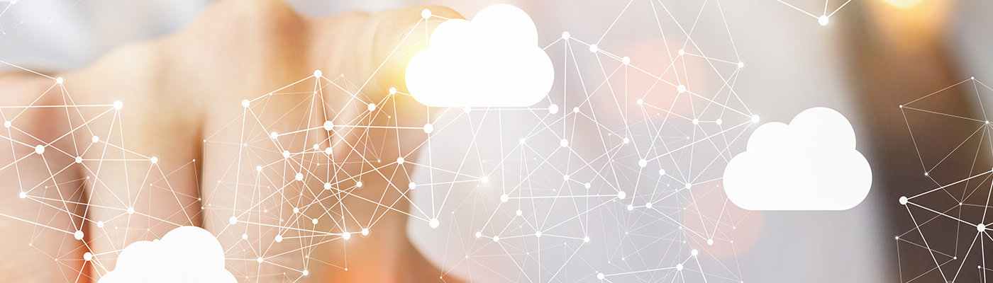 A person's finger selects a cloud icon out of a connected network.