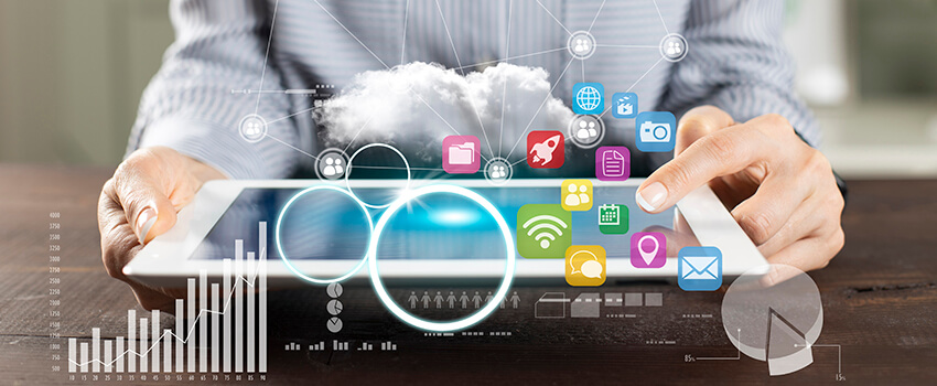 Icons of marketing channels as well as transparent graphs are overlaid on an image of a person holding a tablet, indicating marketing analysis.