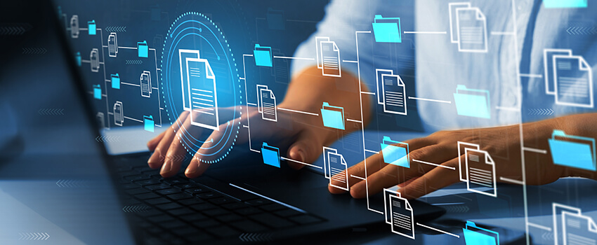 A person types on a keyboard. Overlaid is a holographic map of a folder and file structure.