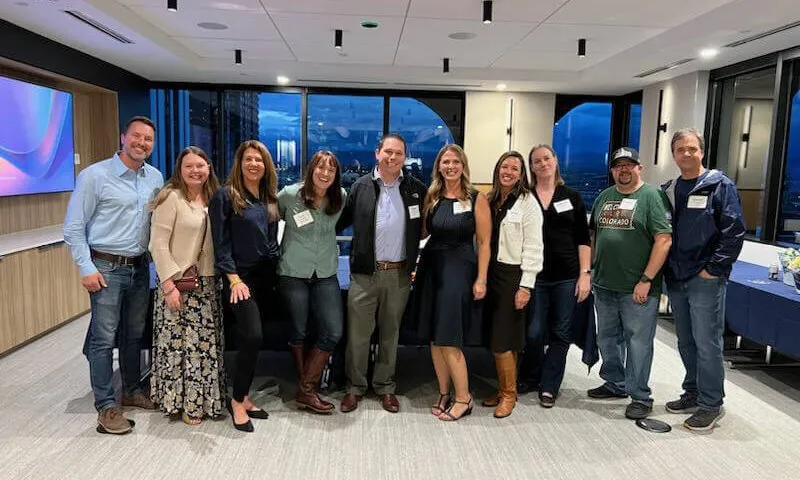 Current RevGeners pose with RevGen alumni at our first Alumni happy hour.
