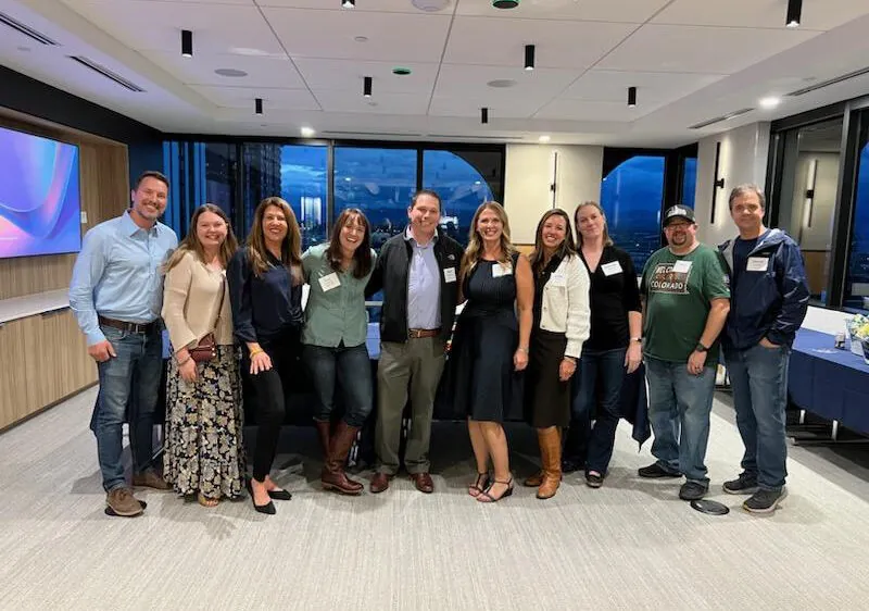 Current RevGeners pose with RevGen alumni at our first Alumni happy hour.