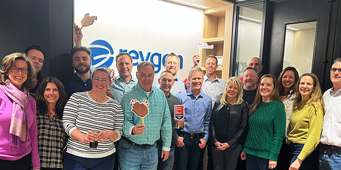 RevGeners gather for a photo at a happy hour celebrating being Great Place to Work Certified