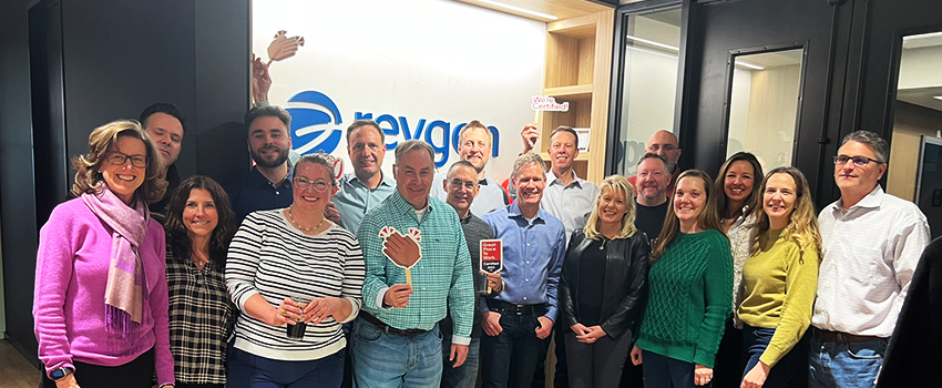 RevGeners gather for a photo at a happy hour celebrating being Great Place to Work Certified