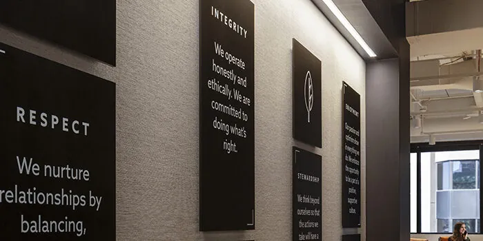 An image of the 4 plaques spelling out the RevGen values - Respect, Integrity, Stewardship, Enjoyment