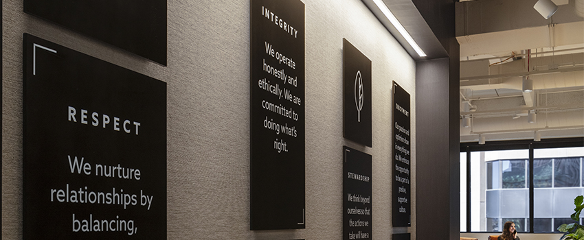 An image of the 4 plaques spelling out the RevGen values - Respect, Integrity, Stewardship, Enjoyment