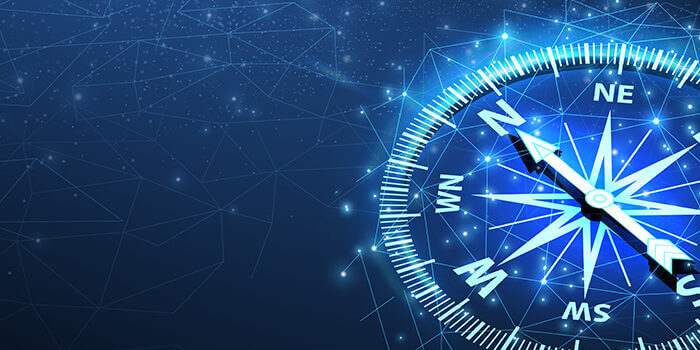 A digital compass pointing north on a blue star-chart background