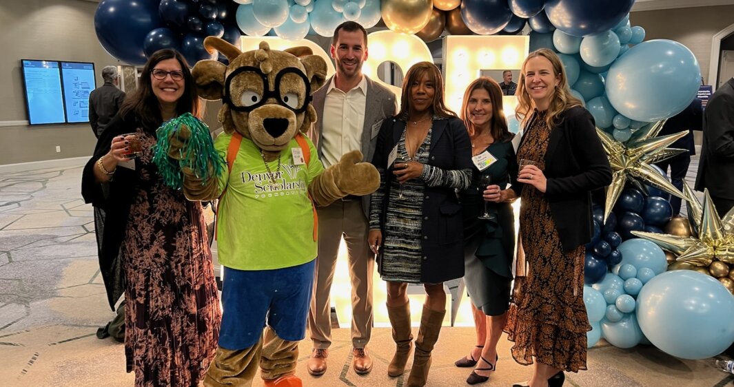 RevGeners pose with Future, the Denver Scholarship Foundation mascot at the 2024 DSF Gala