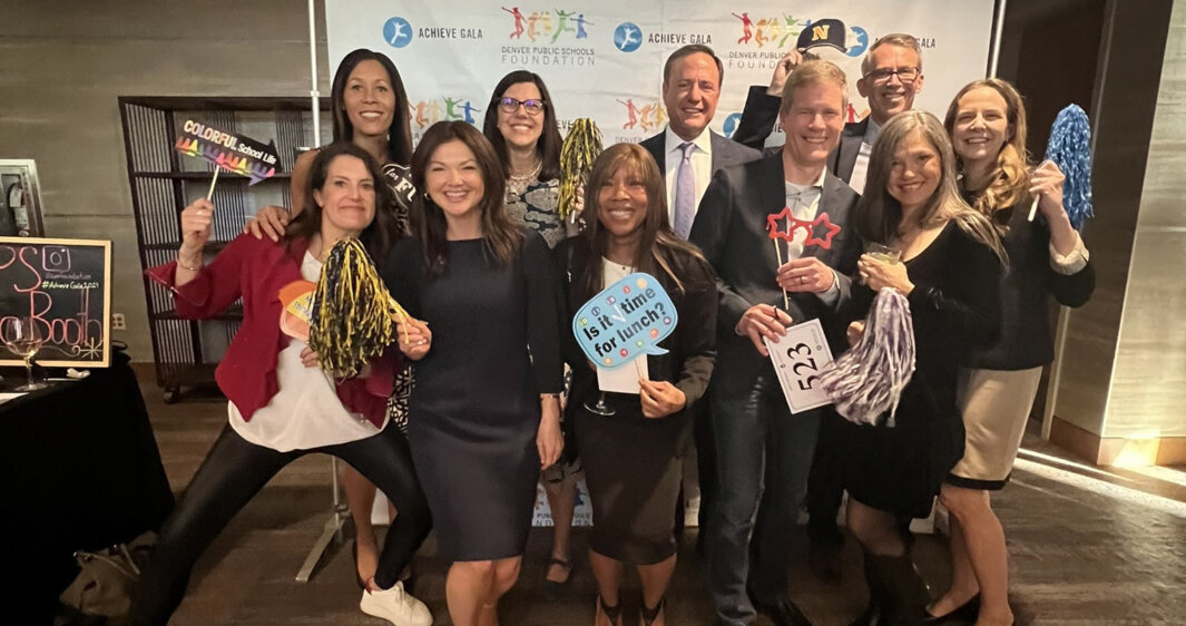 RevGeners pose with props at the Denver Public Schools Foundation 2024 gala