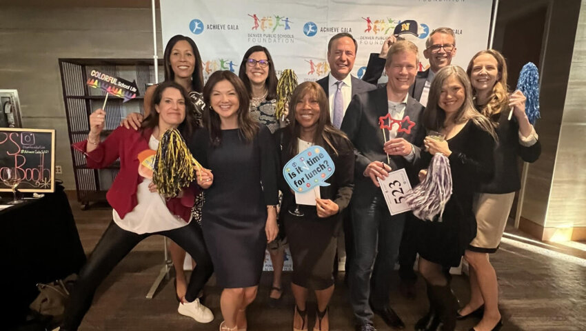 RevGeners pose with props at the Denver Public Schools Foundation 2024 gala