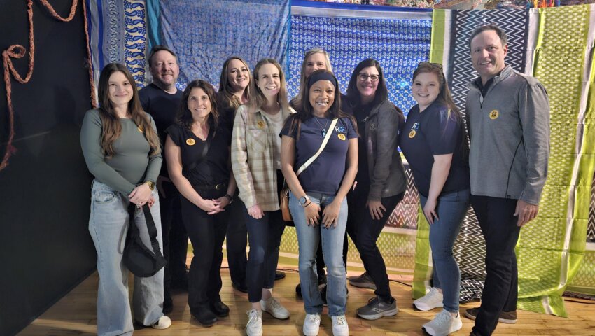 Volunteers pose at the Museo de las Americas during the RevGen 2024 Day of Service