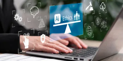 A hologram reading "ai ethics" balancing human and computer on a scale hovers over a person