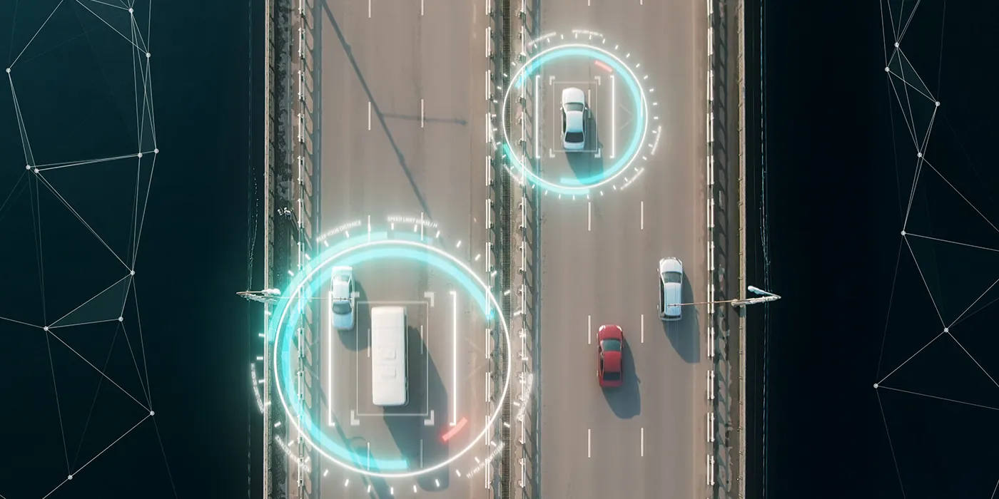 An aerial shot of vehicles being tracked by satellite