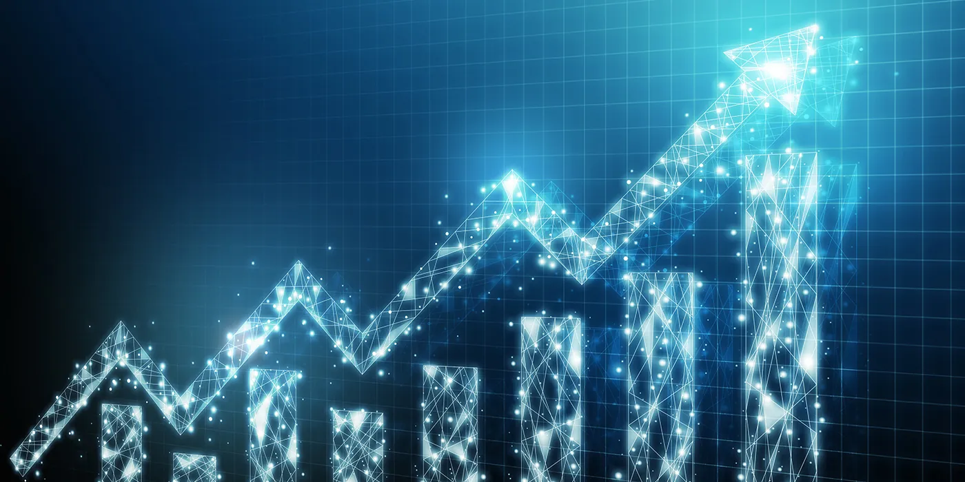 A computer generated image of a sparkling blue revenue line going upward.