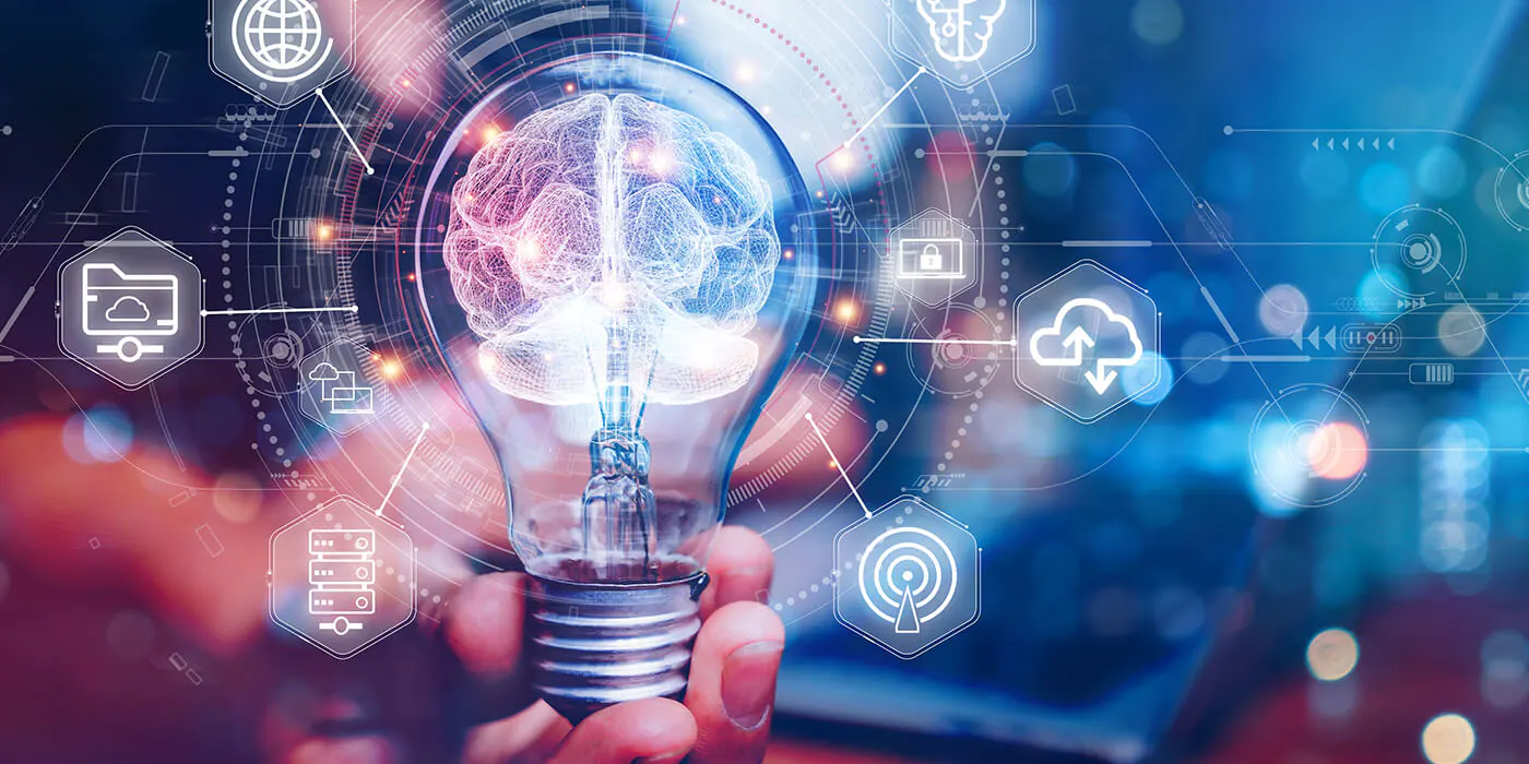 Business person holds out a lightbulb with icons surrounding it symbolizing innovation in data intelligence platforms